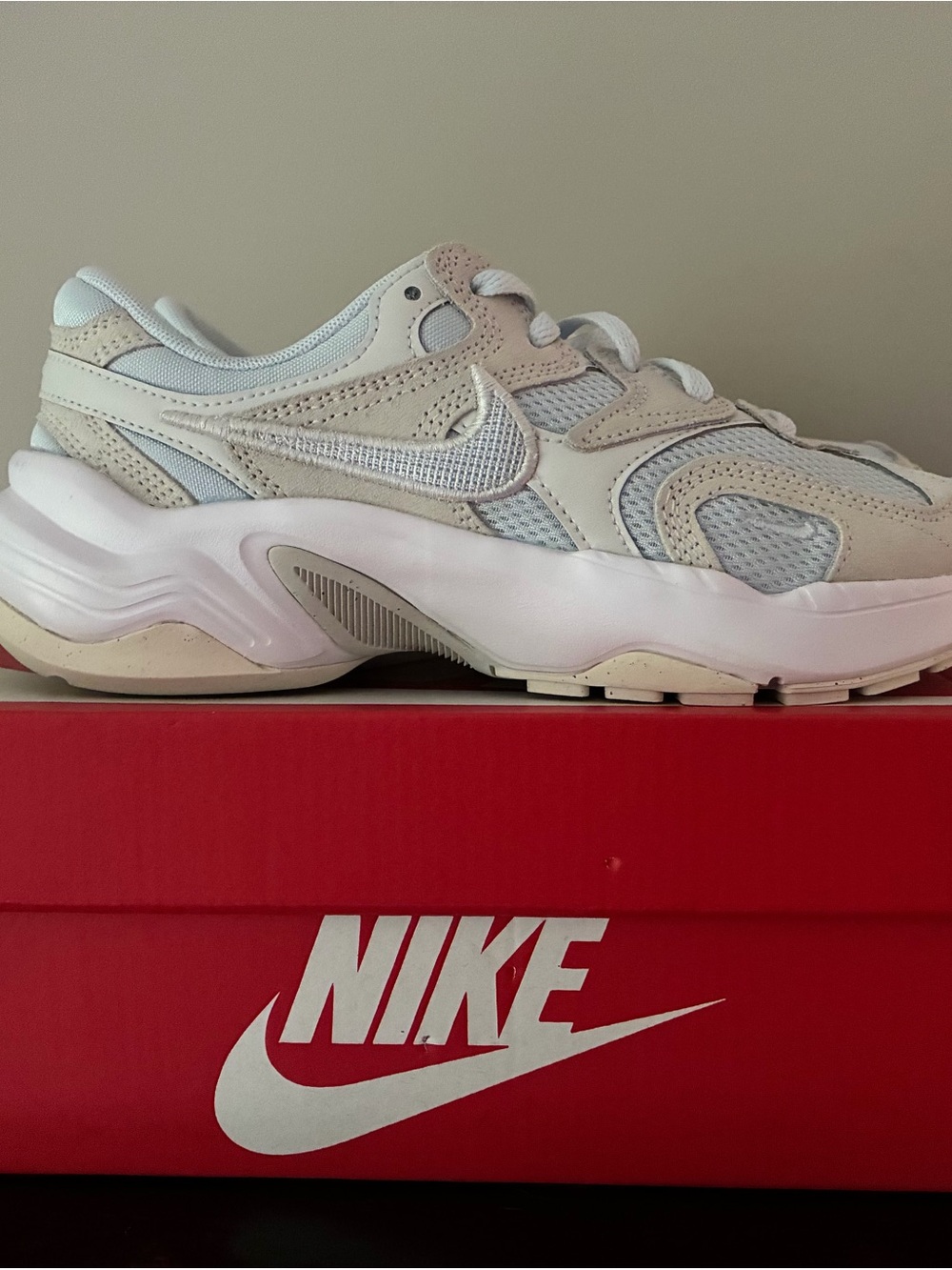 Nike Women’s pastel blue and Light Tan Layered Sneaker